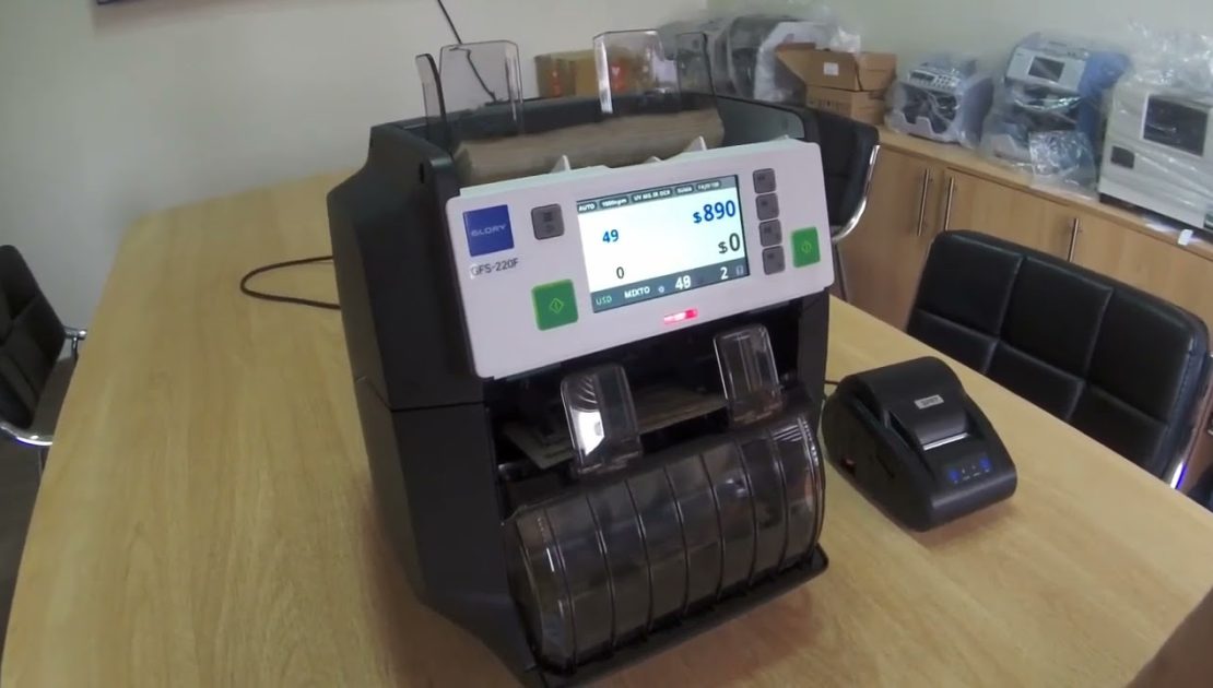 Maquina contadora de billetes